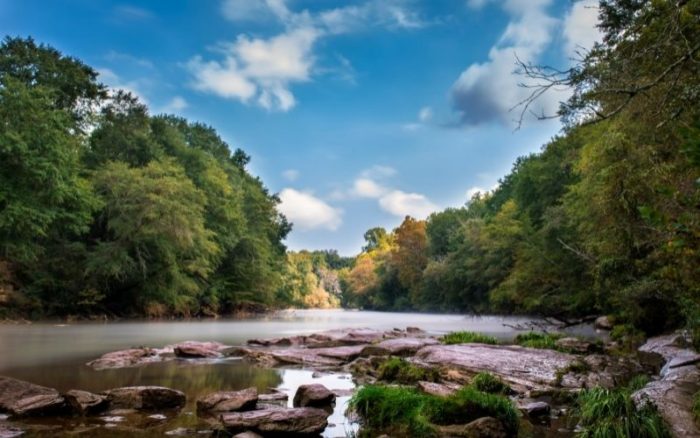 a river with misty water