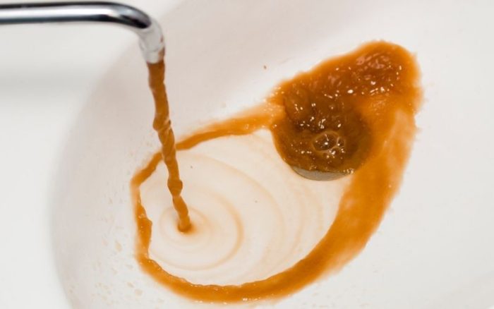 orange color iron water from tap